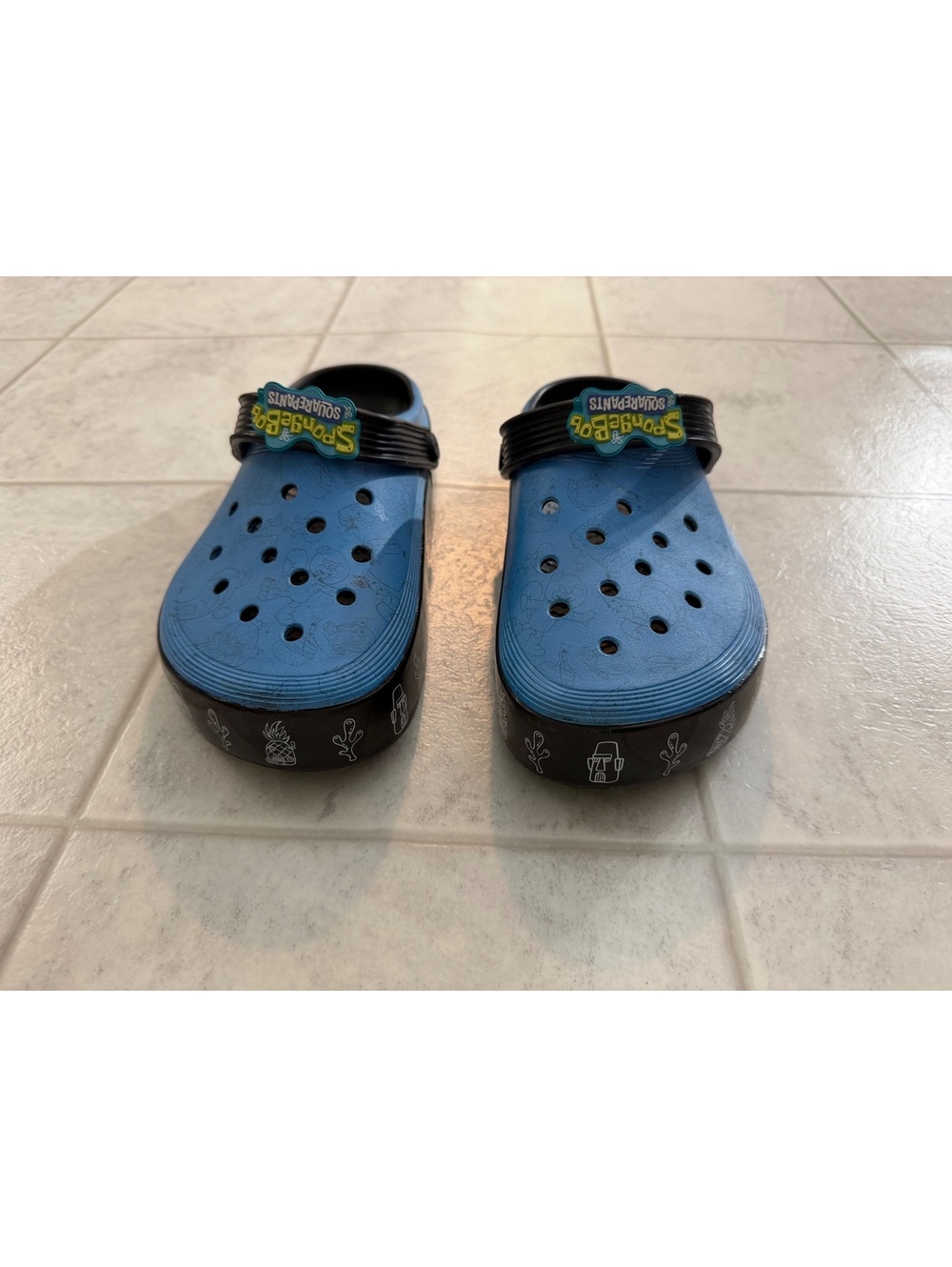 Crocs blue and black clogs